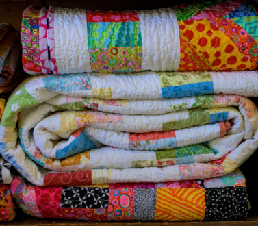 stack of quilts